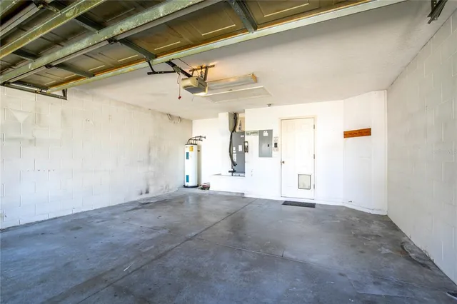 a view of a room with wooden walls