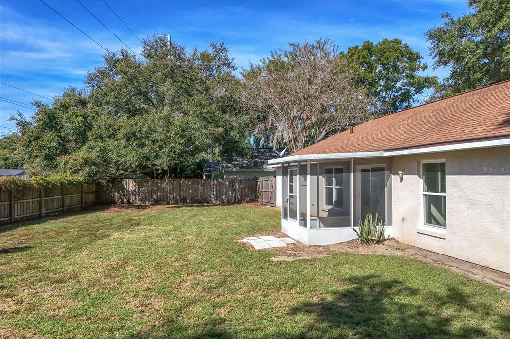 2714 Bayview Drive Eustis, FL 32726 - Photo 30 of 35 a front view of a house with a yard