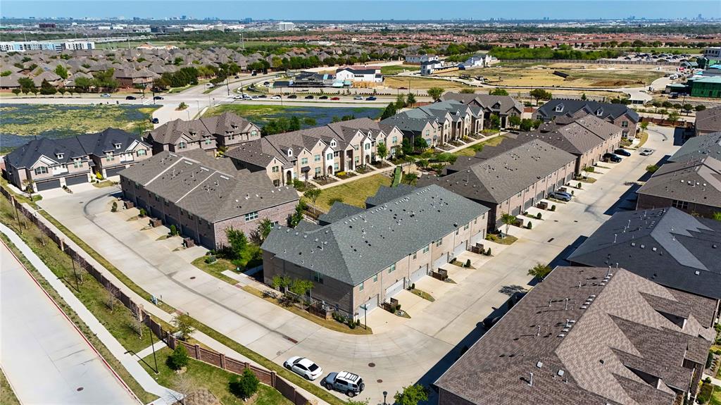 631 Cobblestone Lane Irving, TX 75039 - Photo 25 of 32 an aerial view of a city with lots of residential buildings