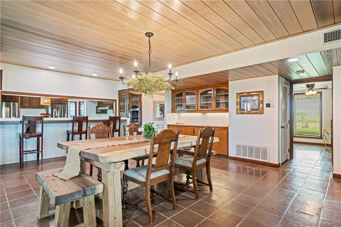 501 South County Road 1140 Riviera, TX 78379 - Photo 10 of 40 Spacious dining room featuring tile flooring, a wo