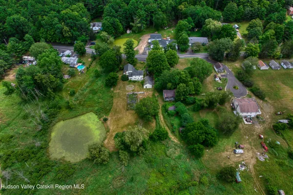 a view of a lake and green space