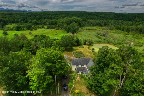 a aerial view of a house with garden