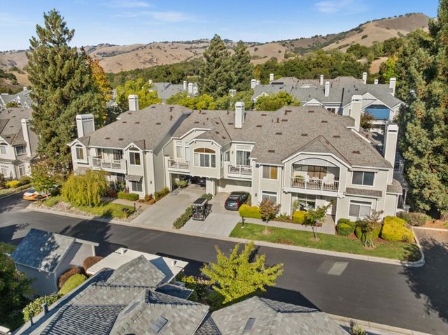 a picture of a bathroom with a shower