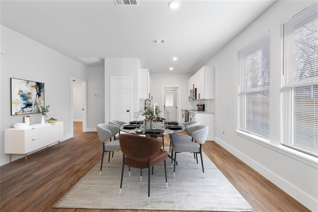 120 Red Bird Lane Mabank, TX 75156 - Photo 2 of 23 a view of a dining room with furniture window and wooden floor