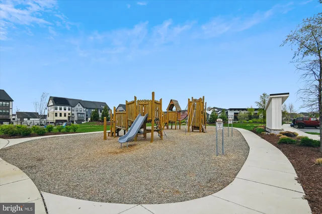 a view of a park with swings