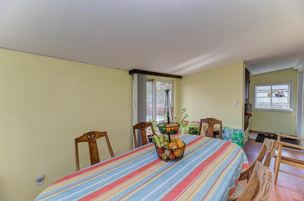 1431 North Hillside Avenue Berkeley, IL 60163 - Photo 12 of 29 a bedroom with a bed and wooden floor