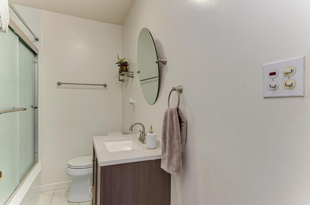 1431 North Hillside Avenue Berkeley, IL 60163 - Photo 9 of 29 a bathroom with a sink toilet and shower