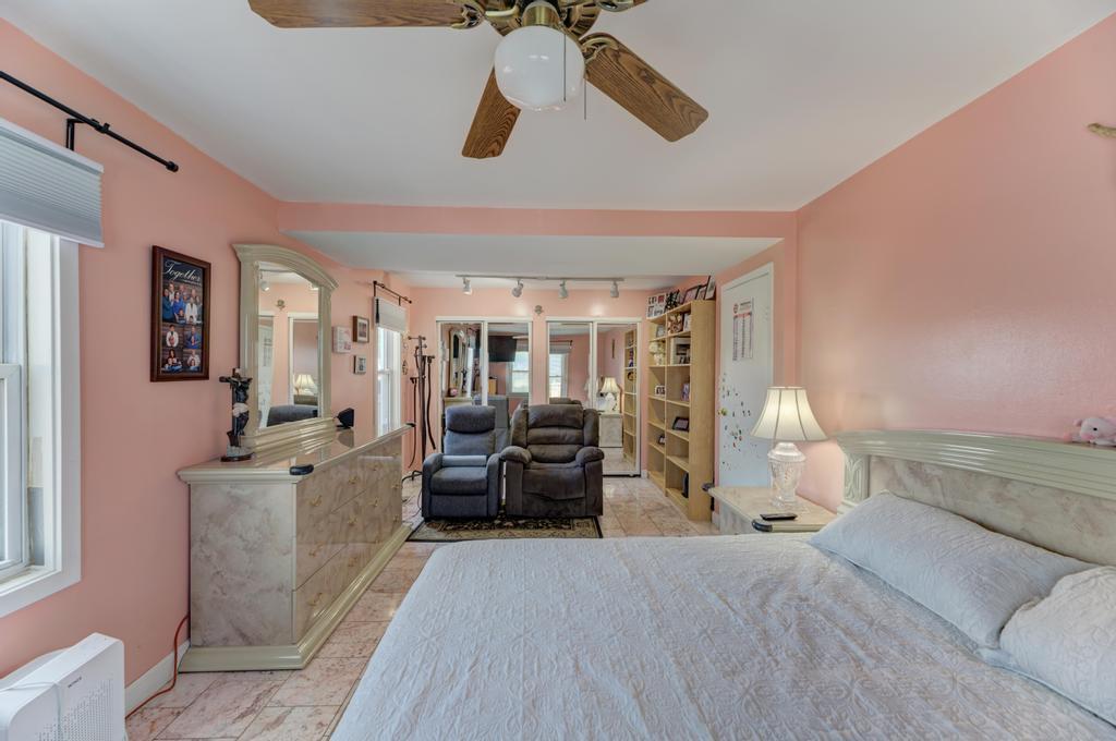 1431 North Hillside Avenue Berkeley, IL 60163 - Photo 10 of 29 a bedroom with furniture and wooden floor