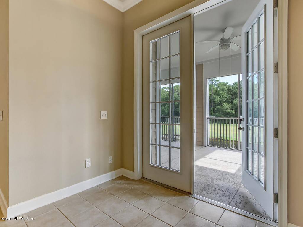 2014 Pond Ridge Court, Unit 1106 Fleming Island, FL 32003 - Photo 20 of 84 To Screened Porch