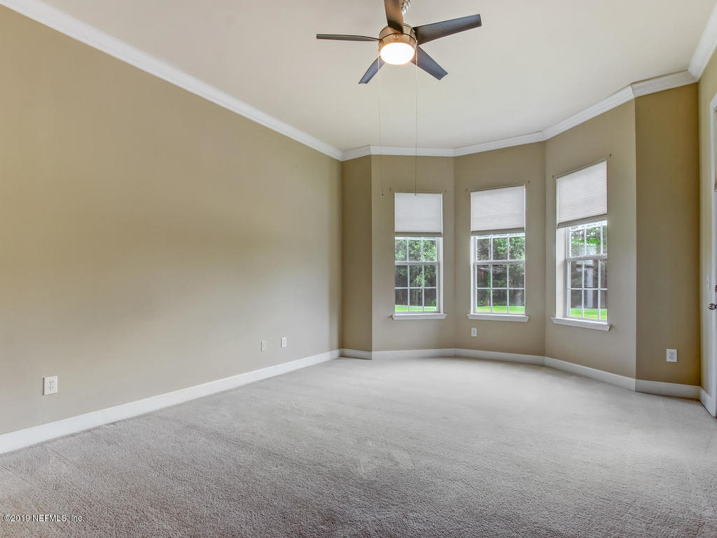 2014 Pond Ridge Court, Unit 1106 Fleming Island, FL 32003 - Photo 22 of 84 Master Bedroom
