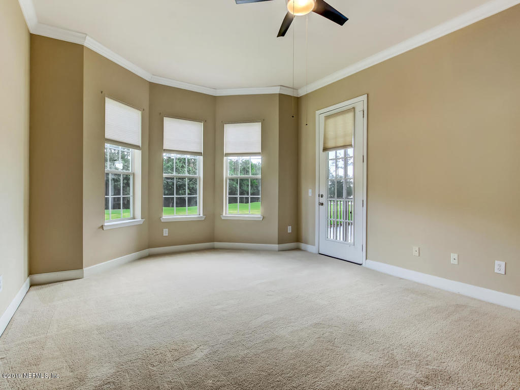 2014 Pond Ridge Court, Unit 1106 Fleming Island, FL 32003 - Photo 23 of 84 Master Bedroom