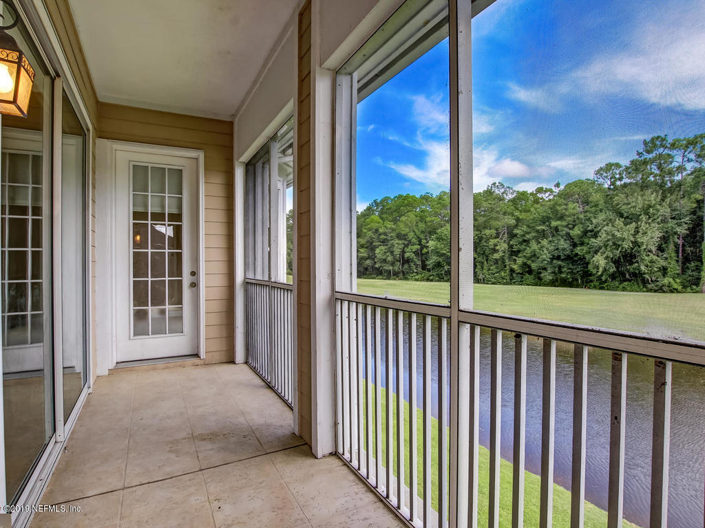 2014 Pond Ridge Court, Unit 1106 Fleming Island, FL 32003 - Photo 39 of 84 Screened Balcony