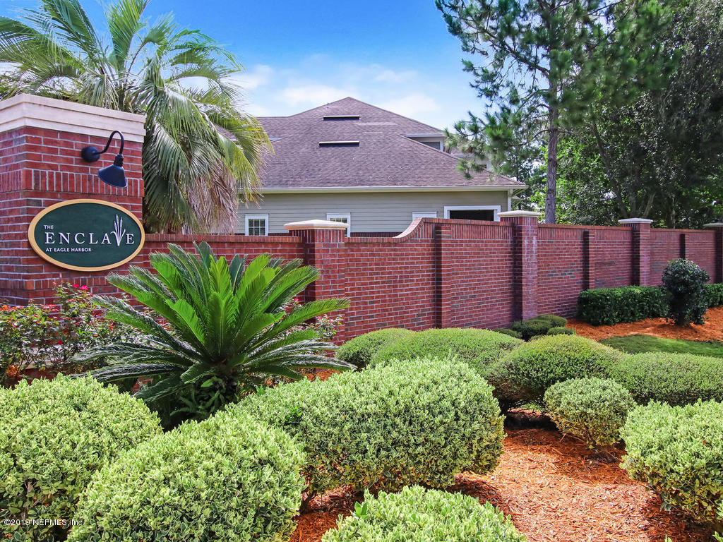 2014 Pond Ridge Court, Unit 1106 Fleming Island, FL 32003 - Photo 44 of 84 The Enclave Enrty