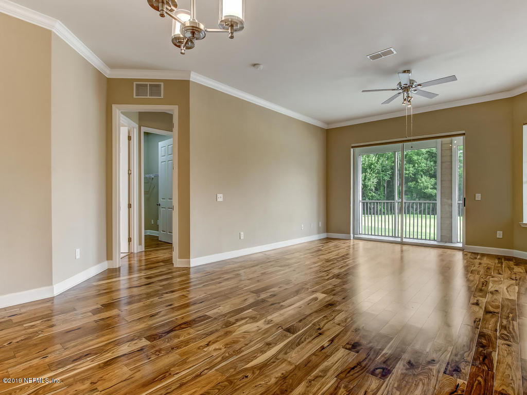 2014 Pond Ridge Court, Unit 1106 Fleming Island, FL 32003 - Photo 8 of 84 Dining/Living Area