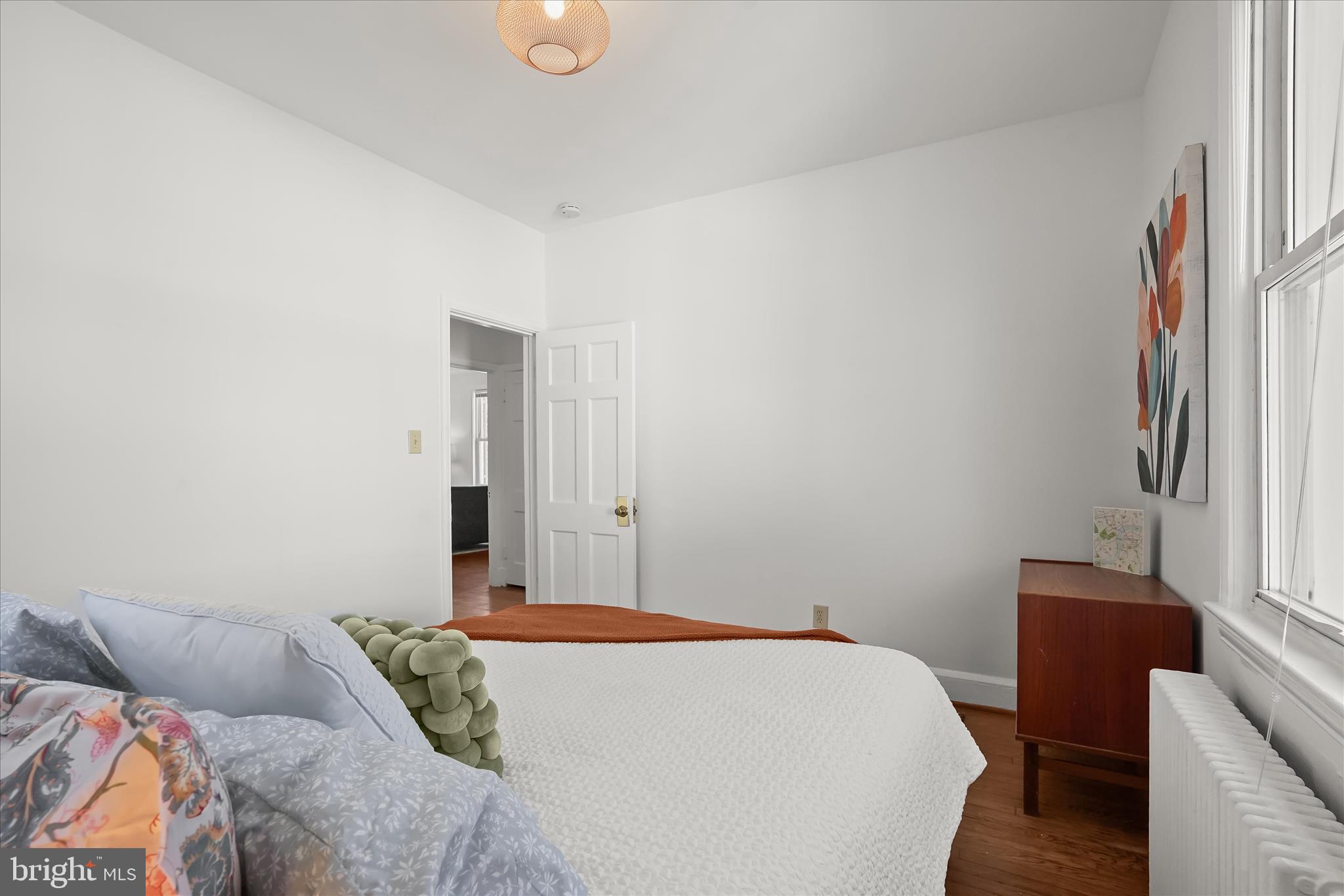 6601 7th Street Northwest Washington, DC 20012 - Photo 21 of 52 a bedroom with a bed and a window