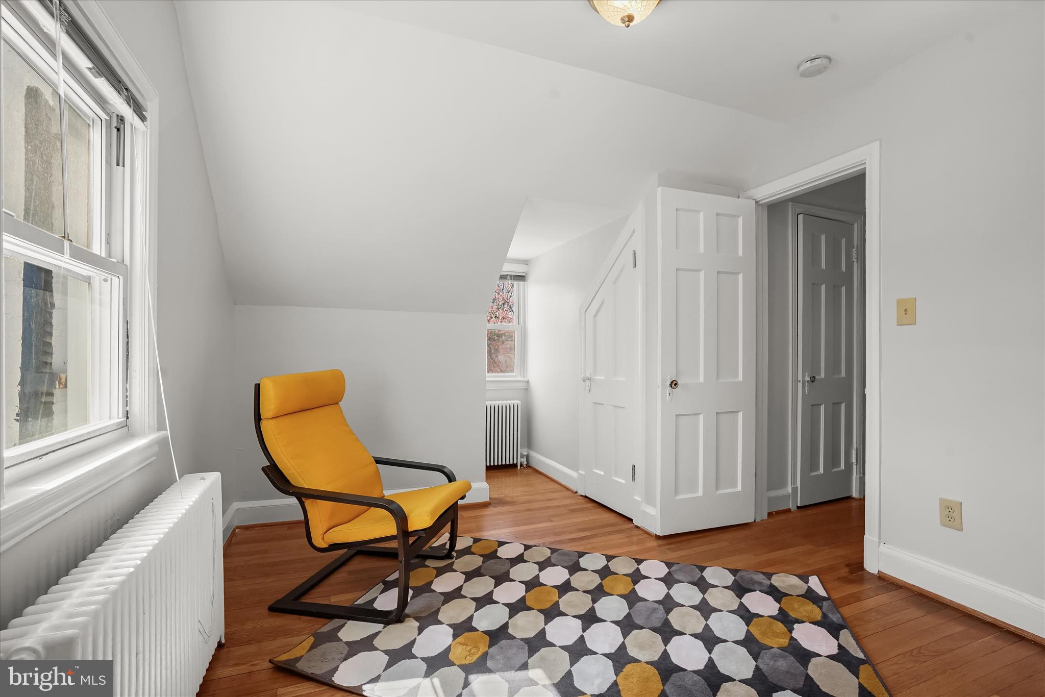 6601 7th Street Northwest Washington, DC 20012 - Photo 22 of 52 a view of a livingroom with lounge chair and front door