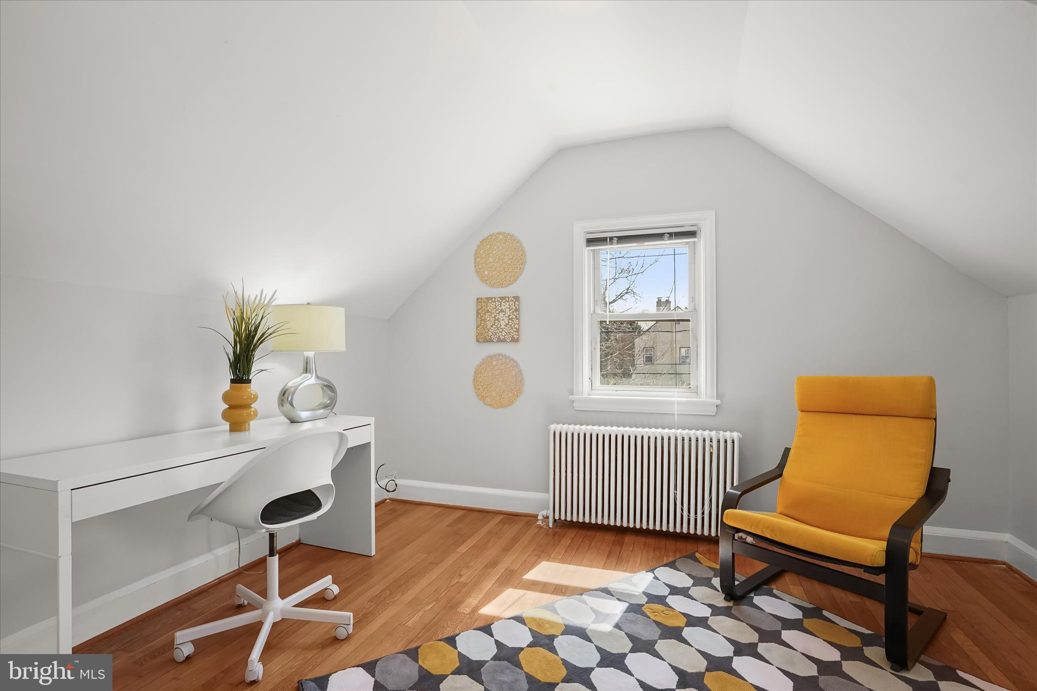 6601 7th Street Northwest Washington, DC 20012 - Photo 23 of 52 a living room with furniture and a window
