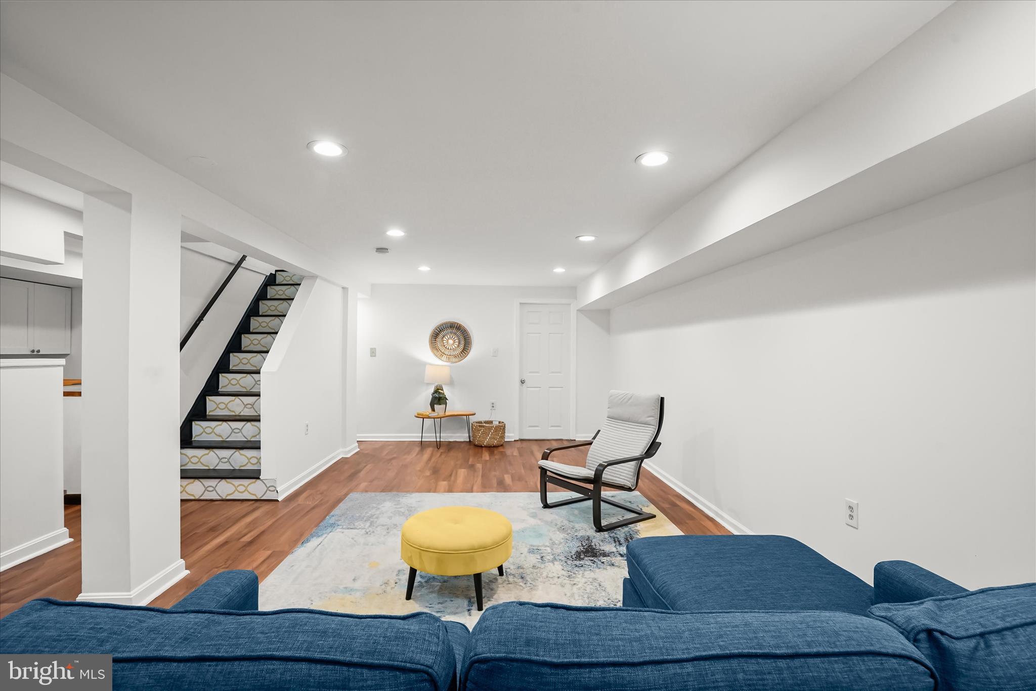 6601 7th Street Northwest Washington, DC 20012 - Photo 31 of 52 a living room with furniture and wooden floor