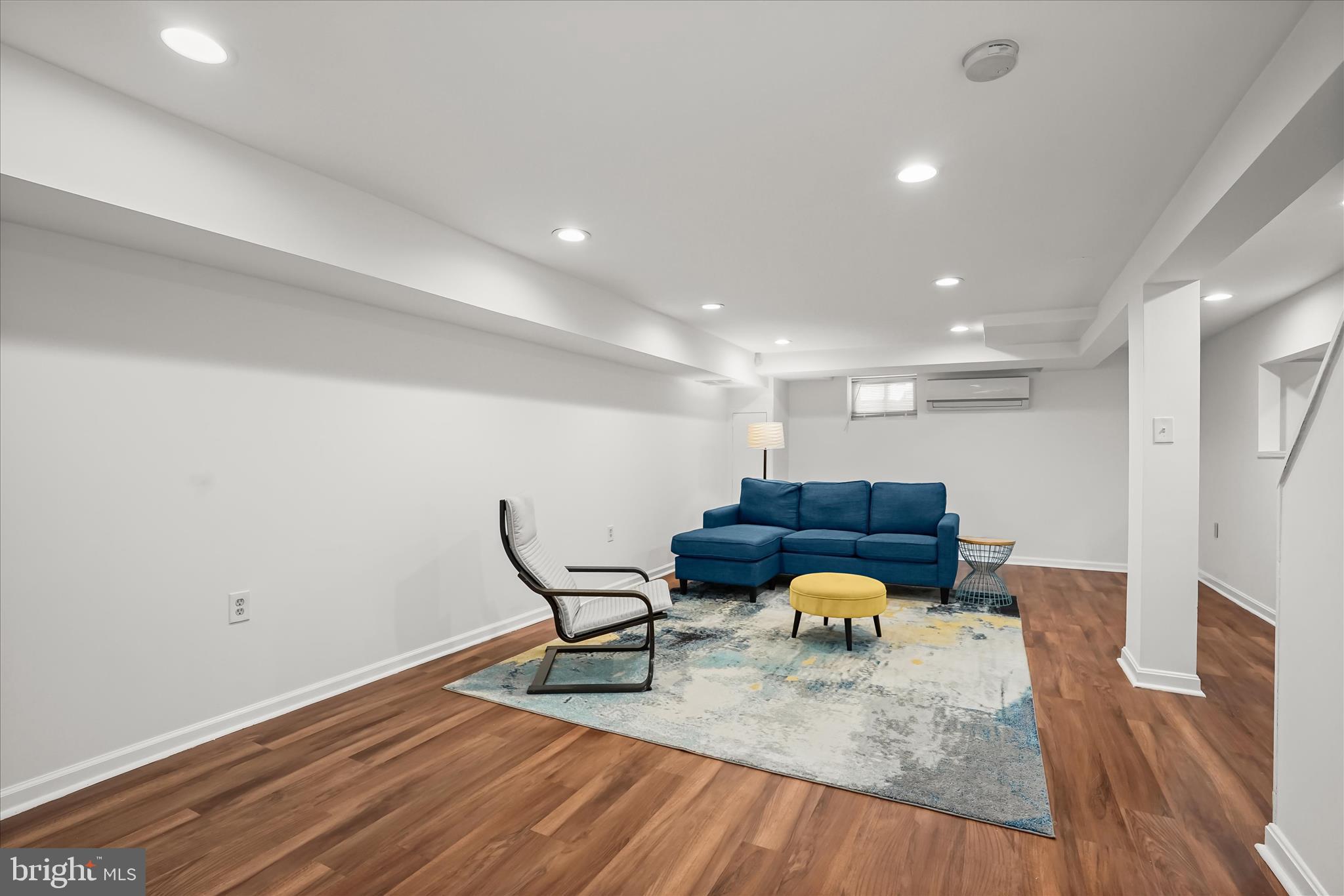 6601 7th Street Northwest Washington, DC 20012 - Photo 6 of 52 a workspace with furniture and wooden floor