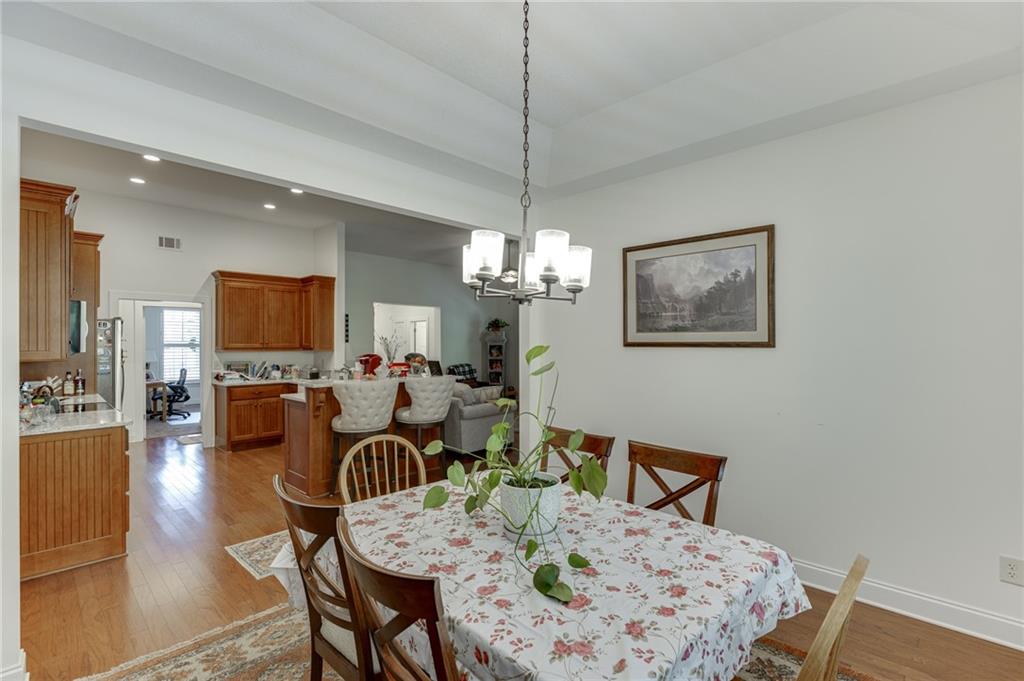 7660 Fern Lane Lula, GA 30554 - Photo 19 of 50 a view of a dining room with furniture