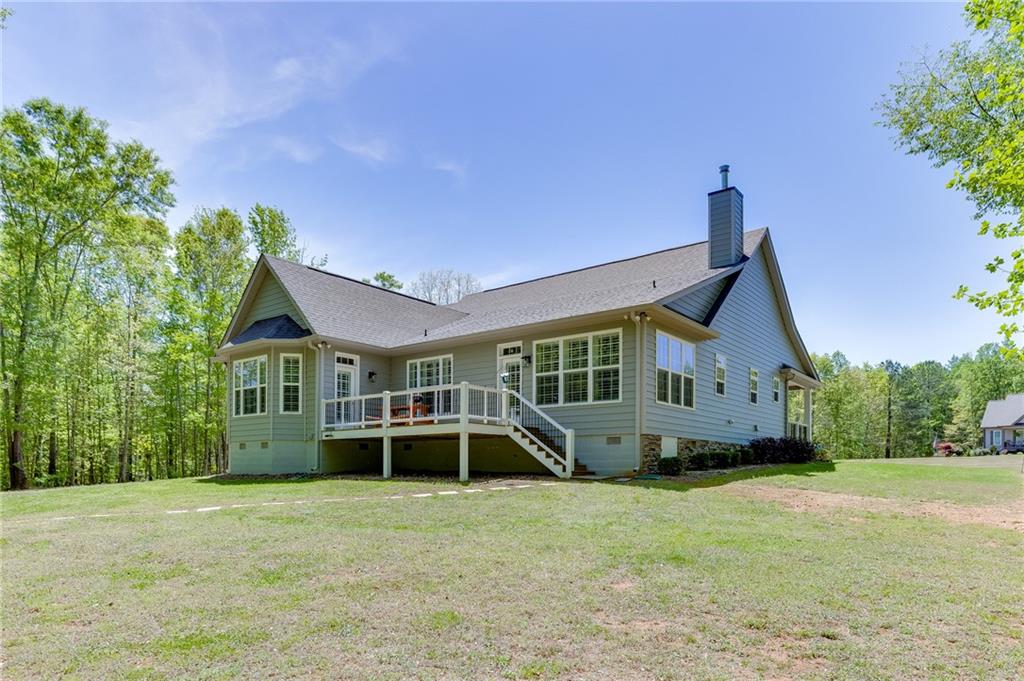 7660 Fern Lane Lula, GA 30554 - Photo 41 of 50 front view of a house with a big yard