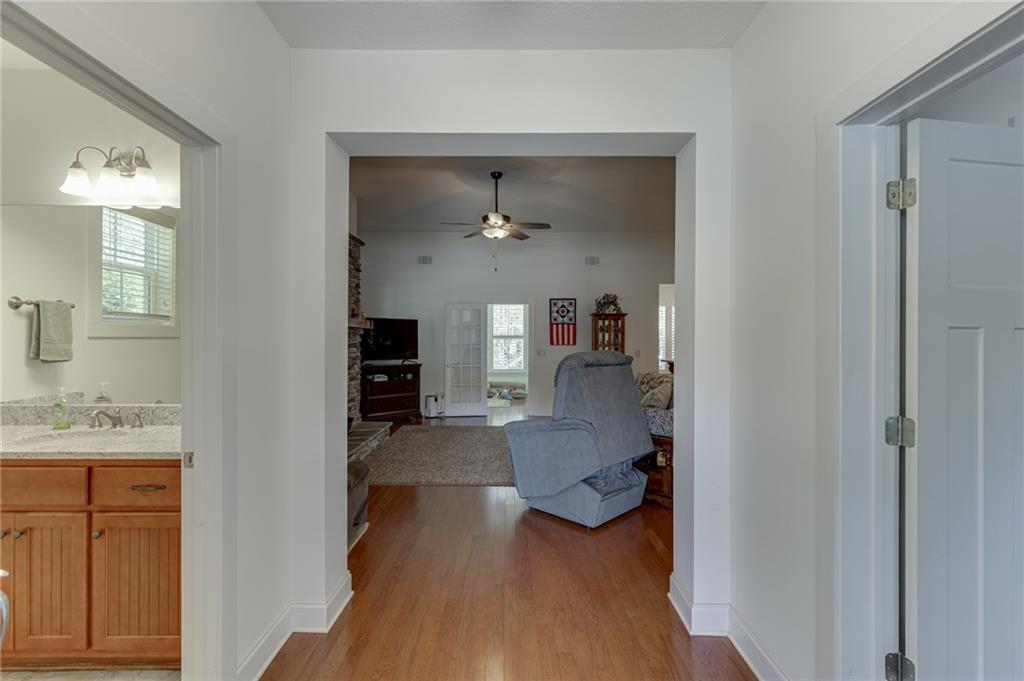 7660 Fern Lane Lula, GA 30554 - Photo 5 of 50 a en suite bathroom with a sink and a mirror