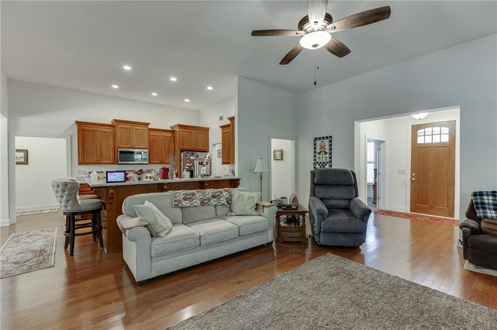 7660 Fern Lane Lula, GA 30554 - Photo 10 of 50 a living room with furniture and kitchen view