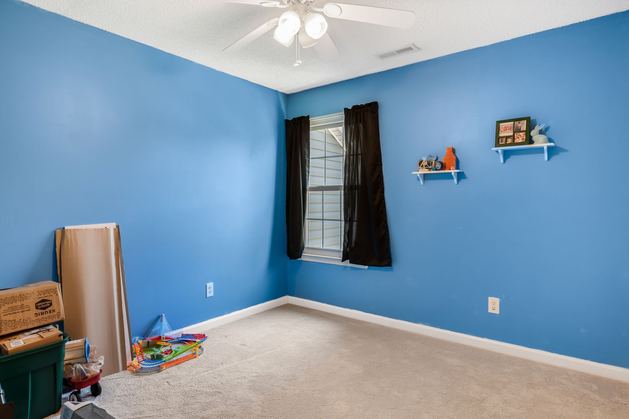 2117 Spring Hill Circle Spring Hill, TN 37174 - Photo 23 of 32 a view of an empty room with a window