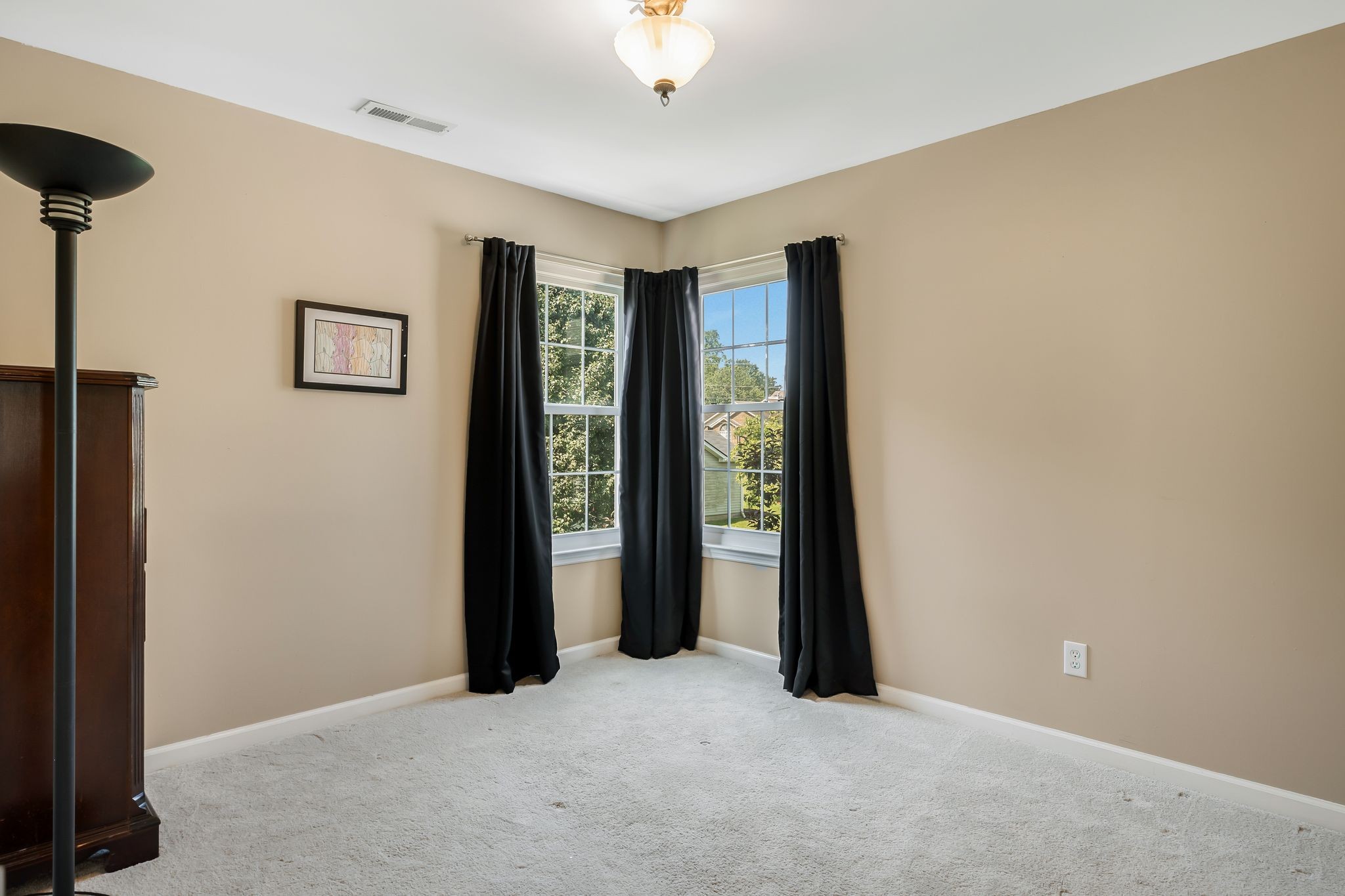 2117 Spring Hill Circle Spring Hill, TN 37174 - Photo 25 of 32 an empty room with windows and closet