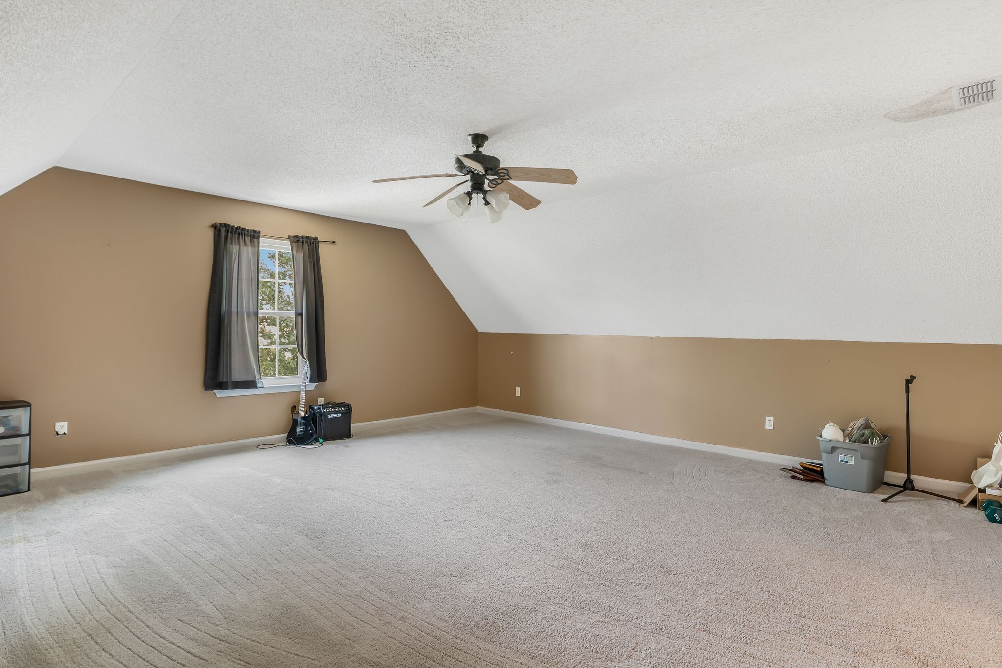 2117 Spring Hill Circle Spring Hill, TN 37174 - Photo 28 of 32 an empty room with windows and fan