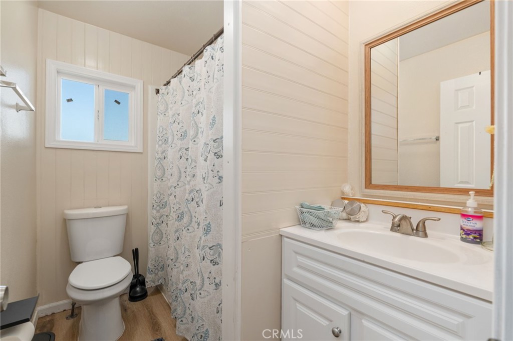 11524 Paramount Road Phelan, CA 92371 - Photo 25 of 34 a bathroom with a sink and a toilet