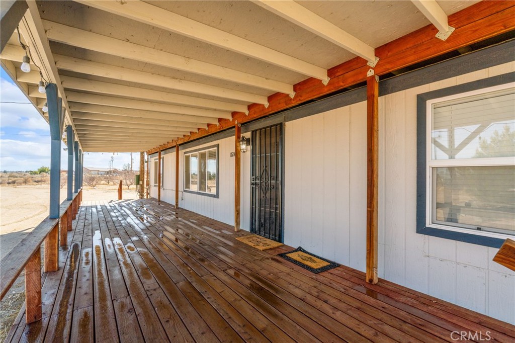 11524 Paramount Road Phelan, CA 92371 - Photo 6 of 34 a view of balcony with wooden floor