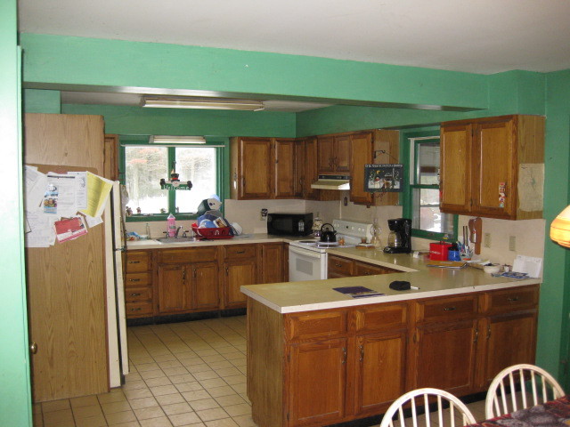 673 Polikoff Road Sheffield, MA 01222 - Photo 3 of 5 a kitchen with stainless steel appliances granite countertop a refrigerator sink and cabinets