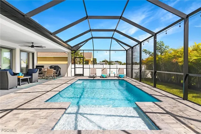 a dining room with tables and chairs