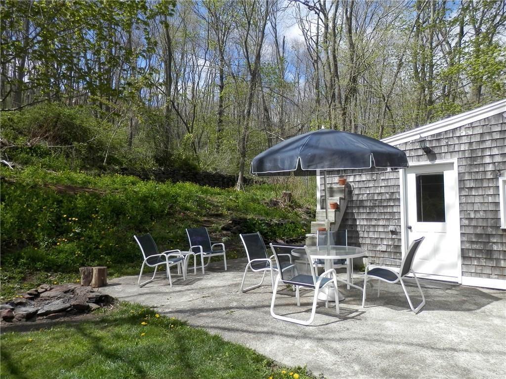 173 West Meadow Road Rockland, ME 04841 - Photo 27 of 28 Sunny patio with fire pit.