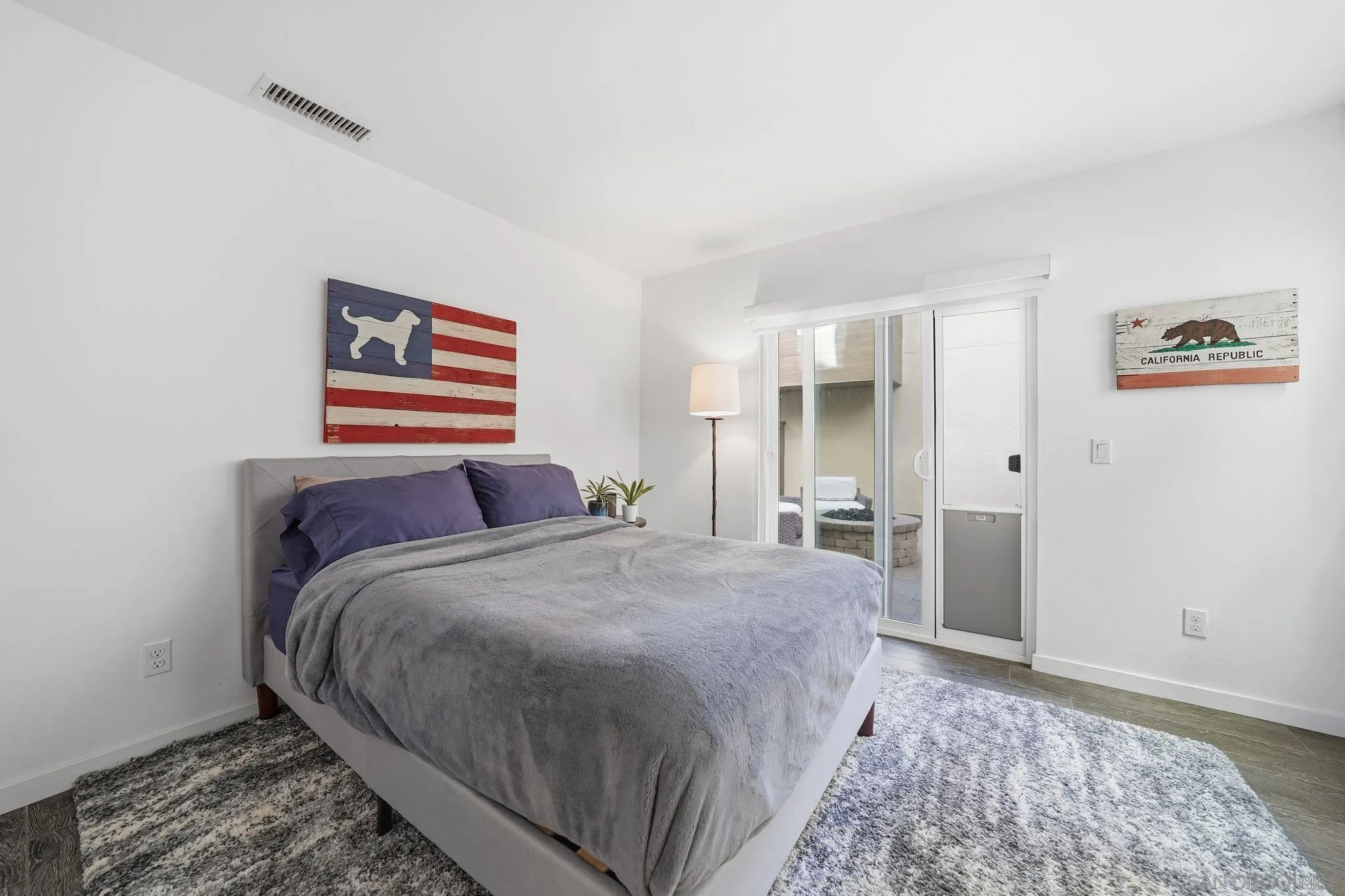 8337 Summit Way San Diego, CA 92108 - Photo 12 of 61 a bedroom with a bed and a painting on the wall