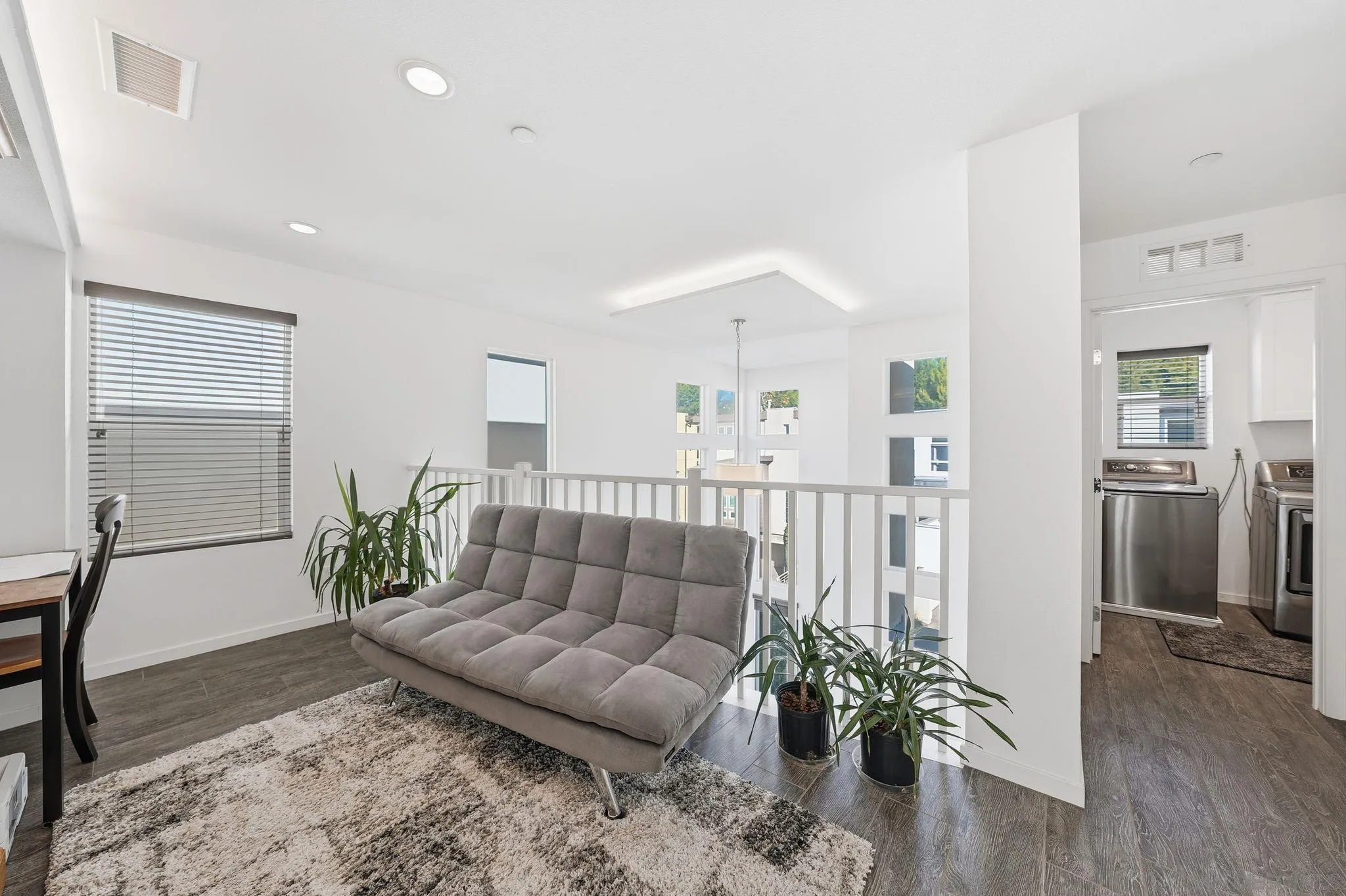 8337 Summit Way San Diego, CA 92108 - Photo 25 of 61 a living room with furniture potted plant and a wooden floor
