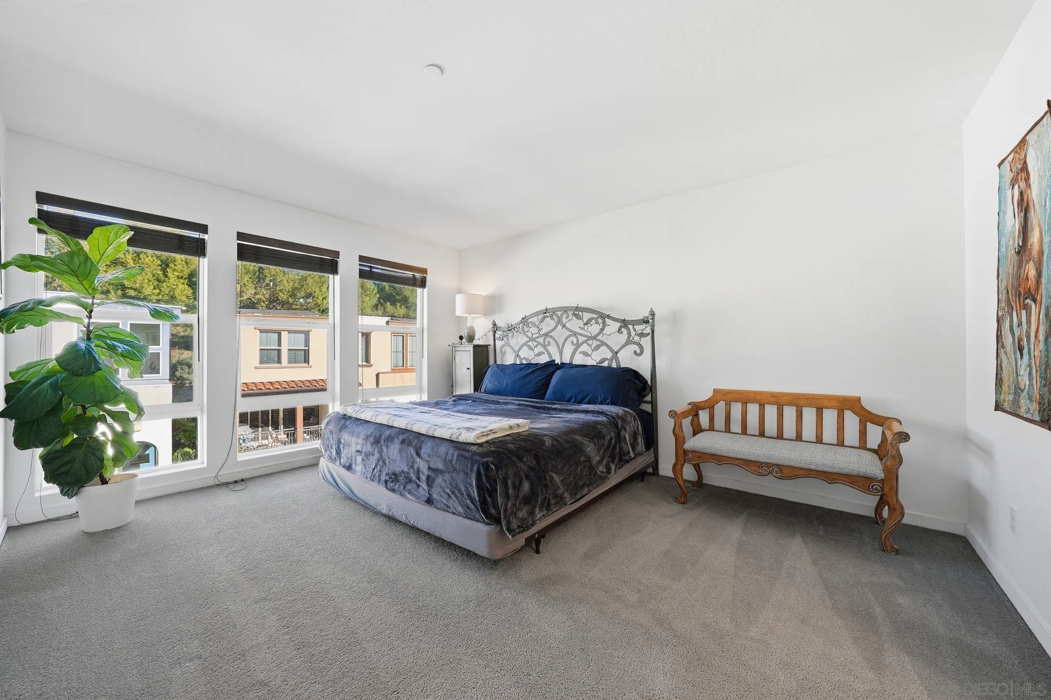 8337 Summit Way San Diego, CA 92108 - Photo 27 of 61 a living room with a bed furniture and a large window