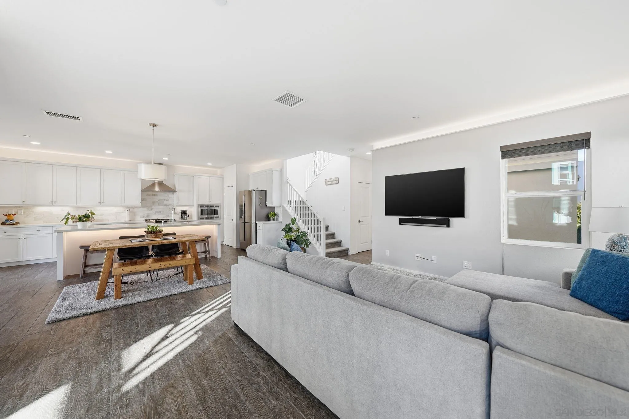 8337 Summit Way San Diego, CA 92108 - Photo 33 of 61 a living room with furniture and a flat screen tv