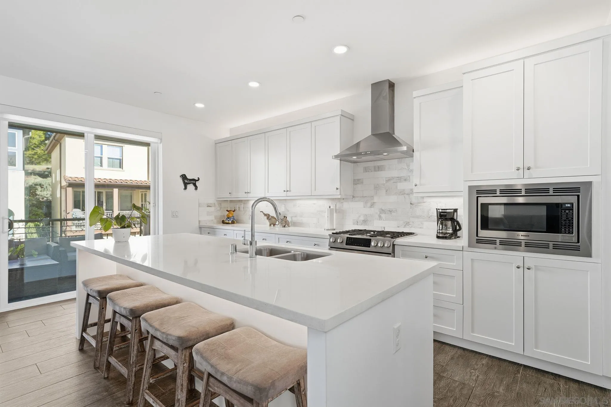 8337 Summit Way San Diego, CA 92108 - Photo 35 of 61 a kitchen with stainless steel appliances a stove a sink and a refrigerator