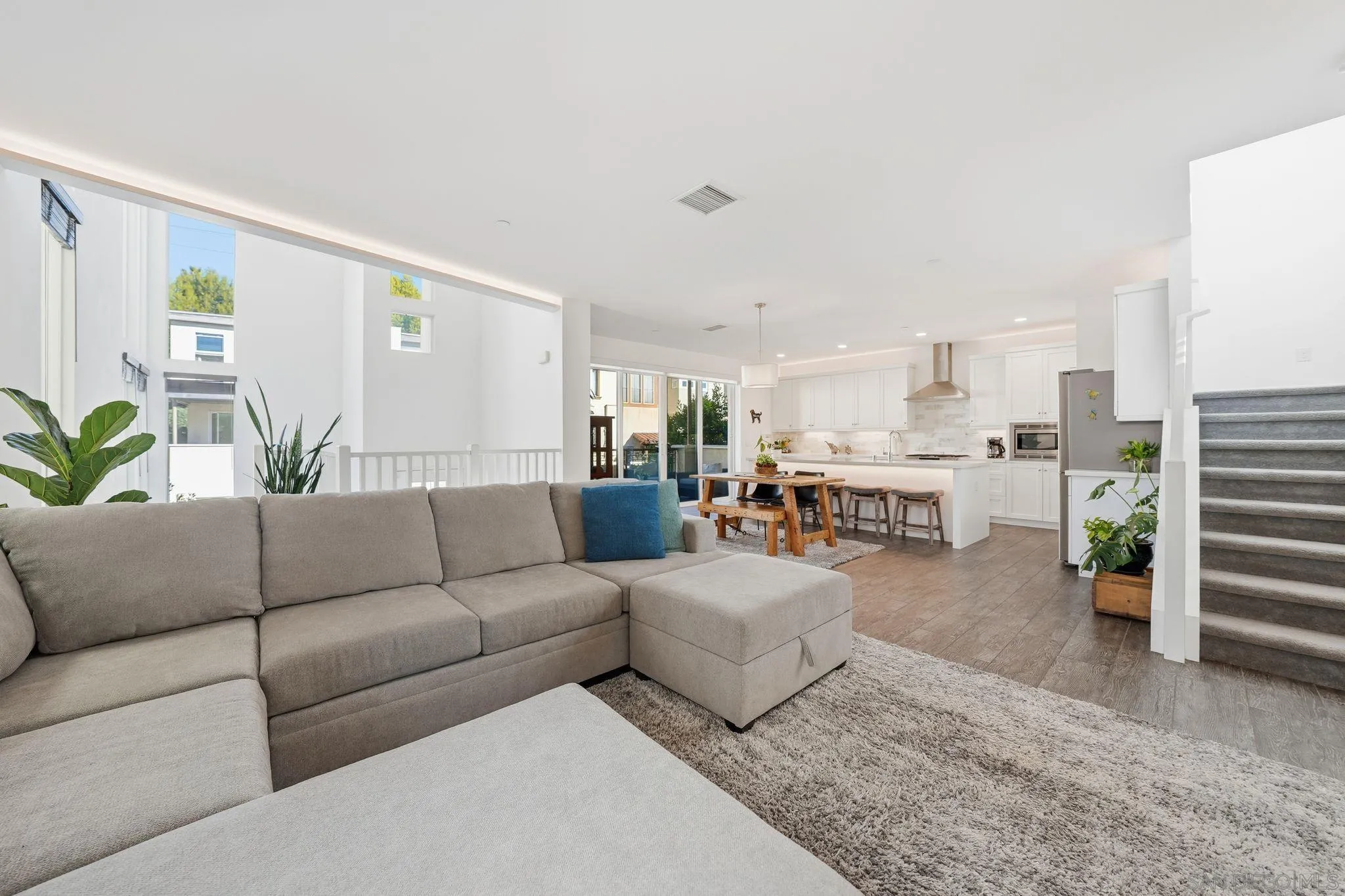 8337 Summit Way San Diego, CA 92108 - Photo 39 of 61 a living room with furniture and a rug