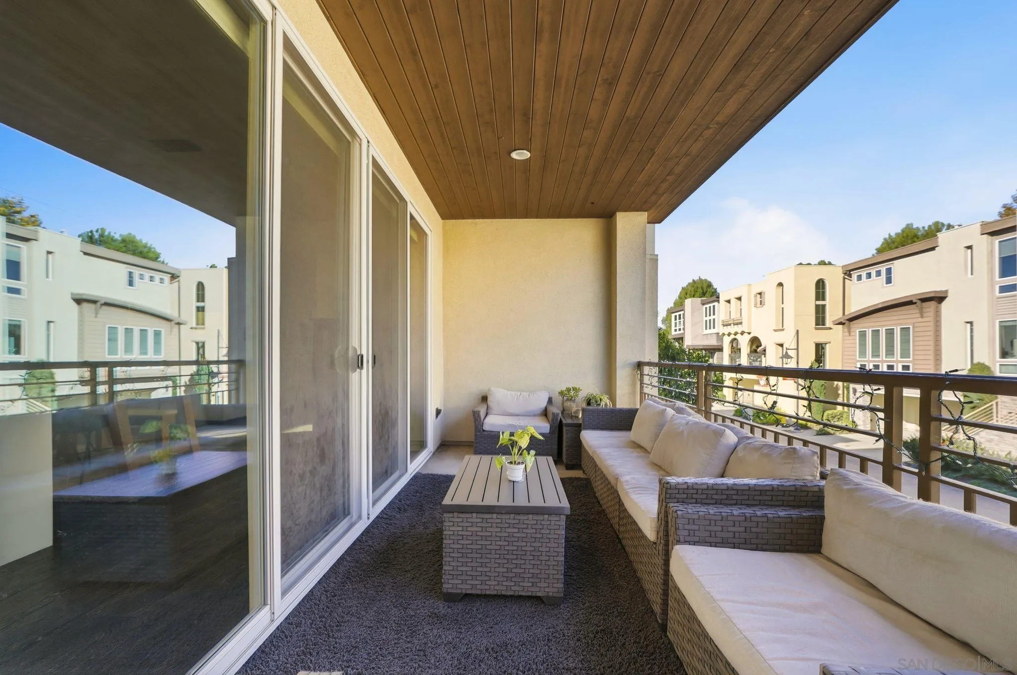 8337 Summit Way San Diego, CA 92108 - Photo 45 of 61 a balcony with furniture and a potted plant