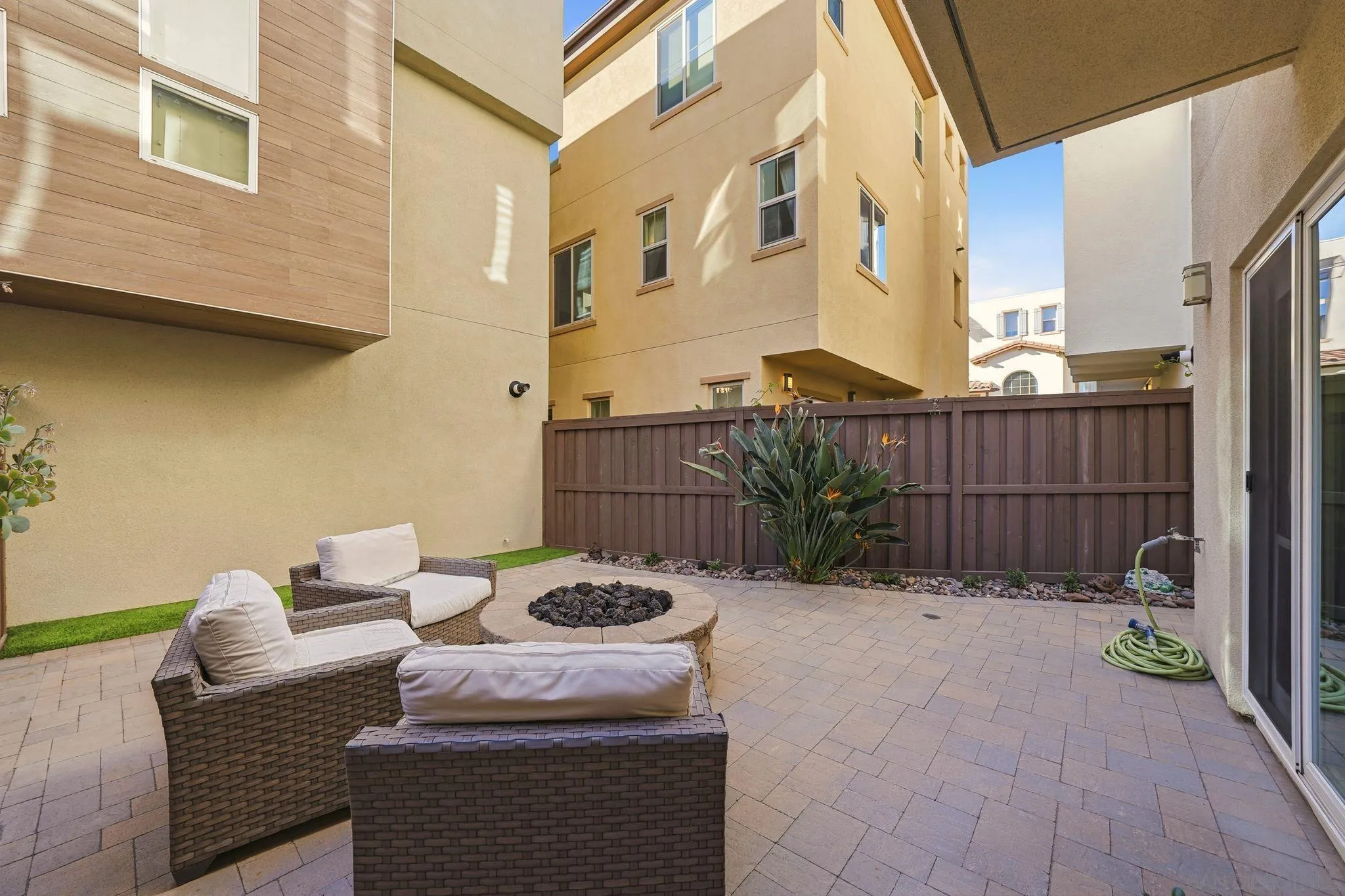 8337 Summit Way San Diego, CA 92108 - Photo 48 of 61 a view of a patio with a table and chairs