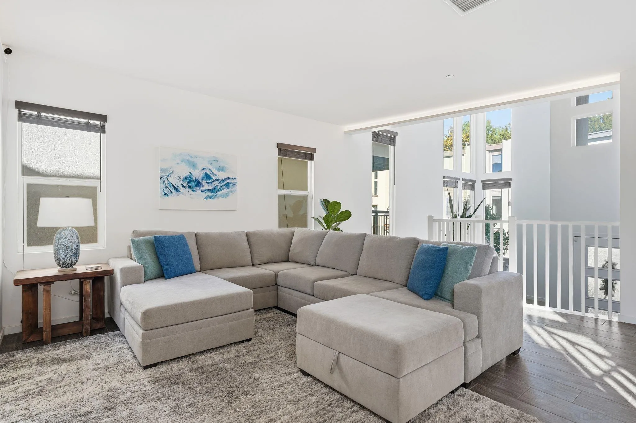 8337 Summit Way San Diego, CA 92108 - Photo 50 of 61 a living room with furniture and a painting on the wall
