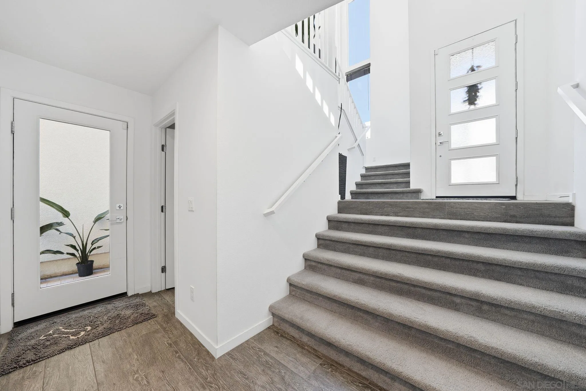 8337 Summit Way San Diego, CA 92108 - Photo 61 of 61 a view of an entryway with wooden floor