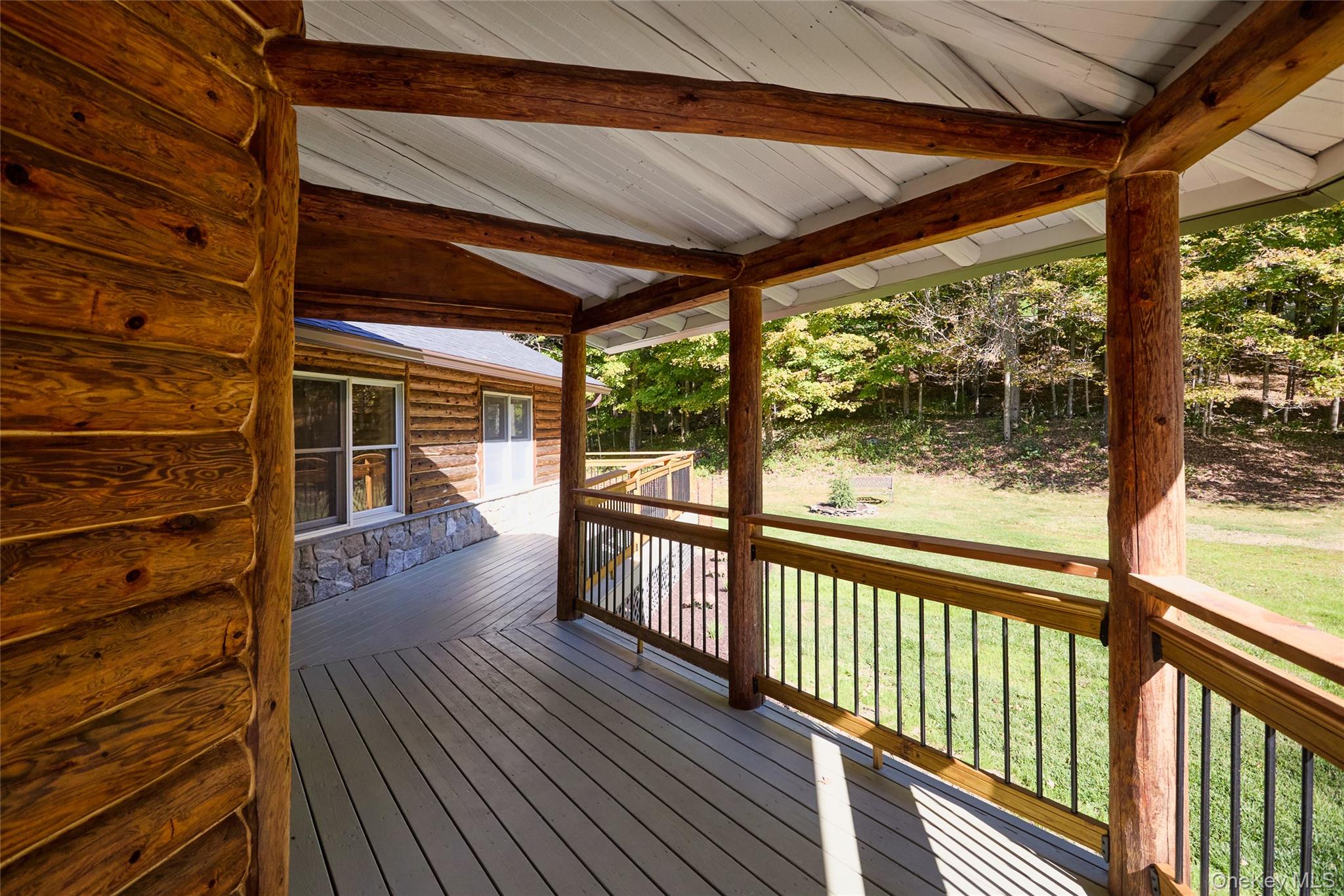 568 Oak Summit Road Millbrook, NY 12545 - Photo 6 of 50 Wooden terrace featuring a lawn