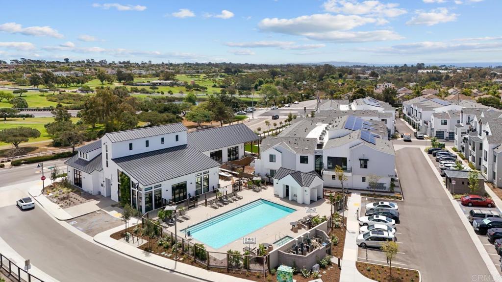 1101 Catania, Unit 104 Encinitas, CA 92024 - Photo 3 of 41 an aerial view of residential houses with outdoor space