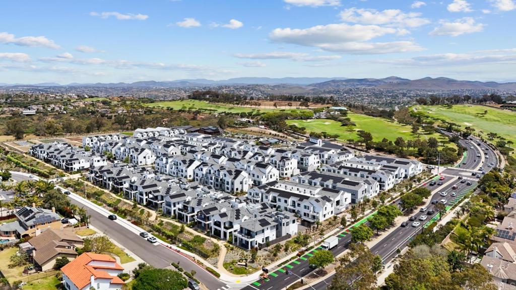1101 Catania, Unit 104 Encinitas, CA 92024 - Photo 39 of 41 an aerial view of residential building with outdoor space