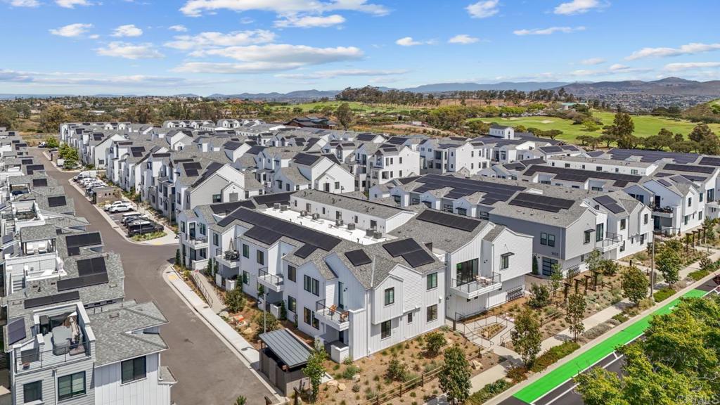 1101 Catania, Unit 104 Encinitas, CA 92024 - Photo 41 of 41 a view of building with an ocean