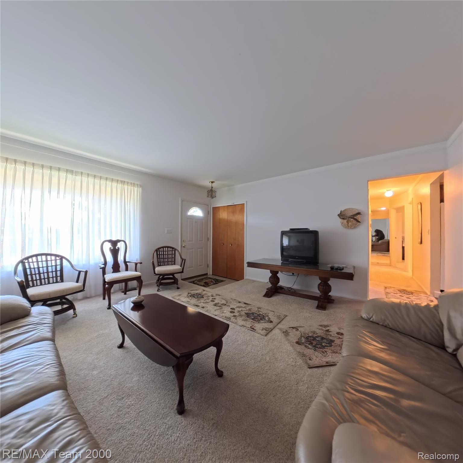 2104 Whittier Road Ypsilanti, MI 48197 - Photo 12 of 45 Living room featuring carpet floors